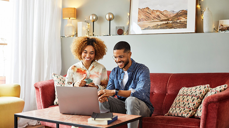 Couple reviewing auto insurance quote.