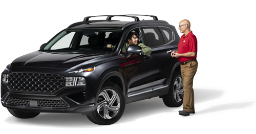 Agent standing by vehicle talking with a customer