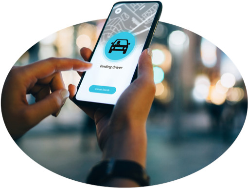 An iPhone displays a rideshare app.