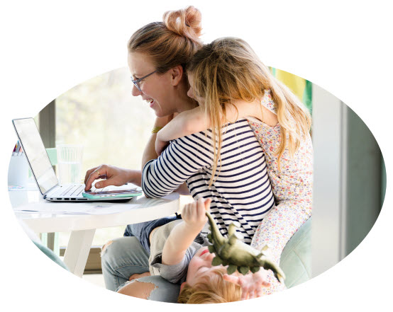 Woman and child looking at laptop.